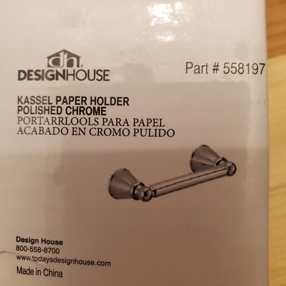 New polished chrome toilet paper holder